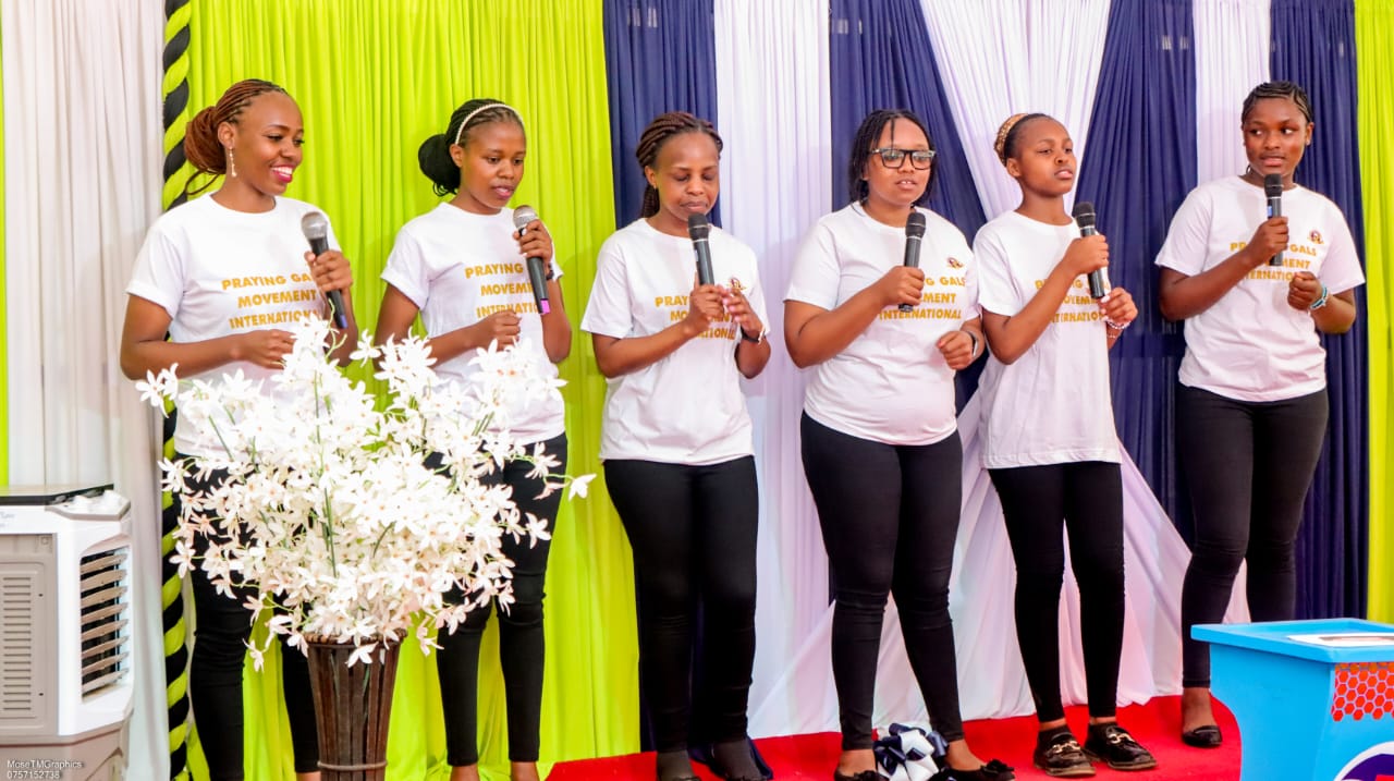 praying girls at Queens Prayer Movement